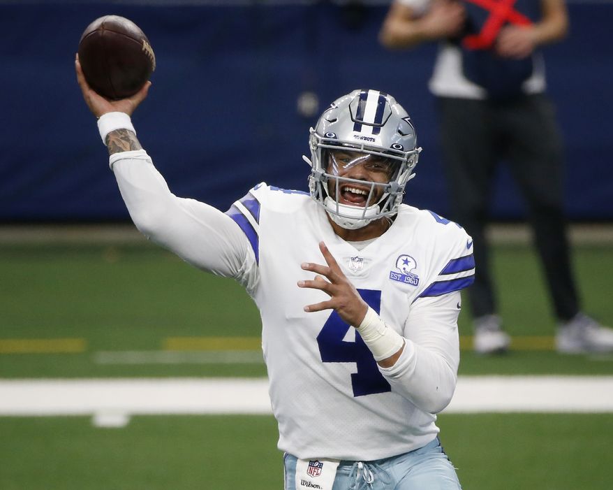 In this Oct. 11, 2020, file photo, Dallas Cowboys quarterback Dak Prescott throws a pass in the first half of an NFL football game against the New York Giants in Arlington, Texas. The Cowboys and Prescott have finally agreed on a contract two years after negotiations began with the star quarterback. The team the agreement was reached Monday, March 8, 2021, with further details to be announced. (AP Photo/Michael Ainsworth, File) **FILE**