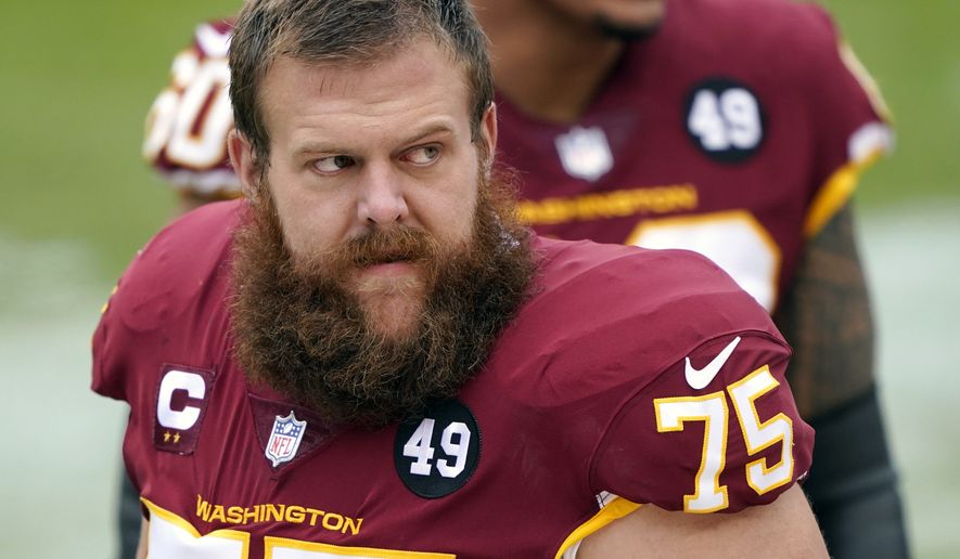 In this Sunday, Dec. 20, 2020, file photo, Washington Football Team offensive guard Brandon Scherff stands on the sideline prior to an NFL football game between the Seattle Seahawks and the Washington Football Team, in Landover, Md. On Monday, March 8, 2021, Washington announced they've placed the franchise tag on guard Brandon Scherff for a second consecutive year. Scherff is coming off his first All-Pro season. (AP Photo/Mark Tenally, File) **FILE**