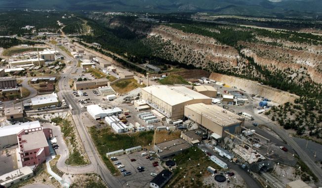 FILE - This undated file photo shows the Los Alamos National laboratory in Los Alamos, N.M. The Santa Fe County Commission has unanimously passed a resolution asking Los Alamos National Laboratory for a new environmental impact statement as it prepares to ramp up production of the plutonium cores used in the nation&#x27;s nuclear arsenal. (The Albuquerque Journal via AP, File)