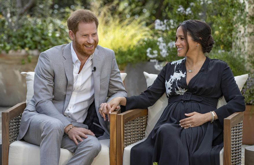 This image provided by Harpo Productions shows Prince Harry, left, and Meghan, Duchess of Sussex, speaking about expecting their second child during an interview with Oprah Winfrey. &amp;quot;Oprah with Meghan and Harry: A CBS Primetime Special&amp;quot; airs March 7 as a two-hour exclusive primetime special on the CBS Television Network. (Joe Pugliese/Harpo Productions via AP)