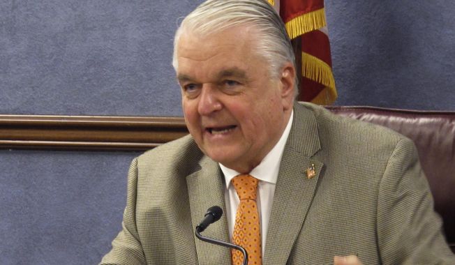 FILE - In this May 7, 2020, file photo, Nevada Gov. Steve Sisolak speaks during a news conference in Carson City, Nev. One year into the pandemic, Nevada Gov. Steve Sisolak is still attempting to strike the right balance between keeping the state&#x27;s tourism industry afloat while also containing the virus. In an interview with the Associated Press, Sisolak said he plans to use Nevada&#x27;s safety protocols as a selling point to bring tourists, conventions, and trade shows back to Las Vegas. (AP Photo/Scott Sonner, File)