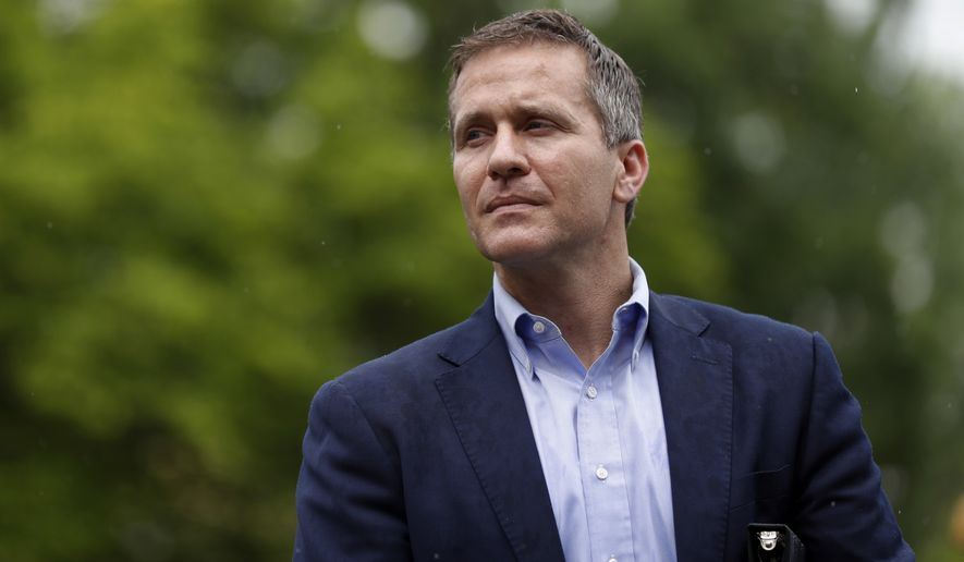 In this May 17, 2018, photo, then Missouri Gov. Eric Greitens waits to deliver remarks to a small group of supporters near the capitol in Jefferson City, Mo. Greitens&#x27; political future seemed doomed by scandal when he resigned as Missouri governor. Now, he appears primed to test whether Sen. Roy Blunt&#x27;s retirement provides a path for redemption within a Republican Party searching for direction after former President Donald Trump&#x27;s election loss. (AP Photo/Jeff Roberson, File)