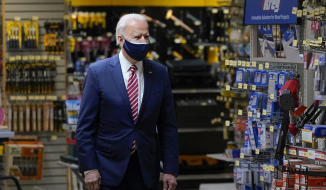 President Joe Biden visits W.S. Jenks &amp;amp; Son hardware store, a small business that received a Paycheck Protection Program loan, Tuesday, March 9, 2021, in Washington. (AP Photo/Patrick Semansky)