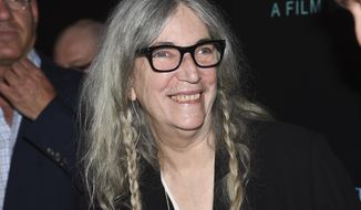 CORRECTS DAY OF CONCERT - FILE - Patti Smith attends a special screening of &amp;quot;Pavarotti&amp;quot; at the iPic Theater in New York on May 28, 2019. Smith performed a mini-concert at the Brooklyn Museum on Tuesday, March 9, to honor photographer Robert Mapplethorpe and also adding her voice to a series of pop-up events that represent the city’s first baby steps toward the return of live indoor performances. (Photo by Evan Agostini/Invision/AP, File)