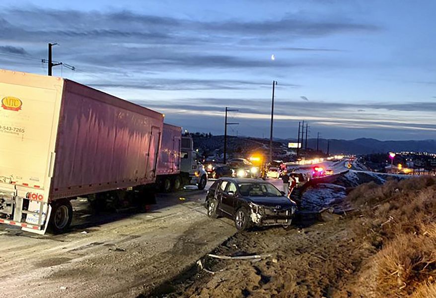 This photo provided by the Nevada Highway Patrol shows a pileup along U.S. 395 outside of Reno, Nev., on Tuesday, March 9, 2021. One person was seriously injured Tuesday in a 17-vehicle pileup blamed by the Nevada Highway Patrol on excessive speed and icy conditions on southbound U.S. 395 in Reno's northern outskirts. (Nevada Highway Patrol via AP)