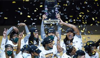 Wright State celebrates after defeating IUPUI 53-41 in the championship NCAA college basketball game in the women&#39;s Horizon League conference tournament in Indianapolis, Tuesday, March 9, 2021. (AP Photo/Michael Conroy)