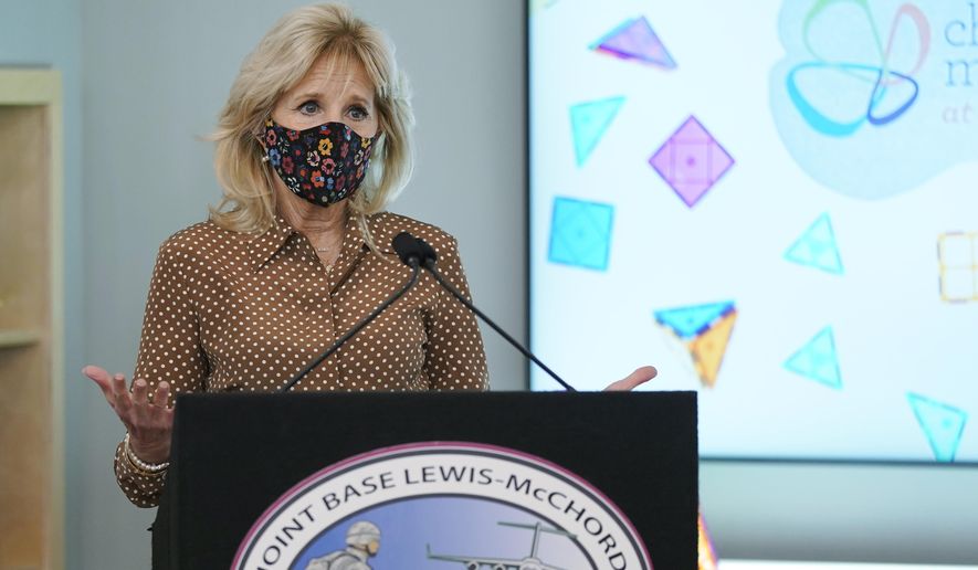 First lady Jill Biden speaks during a tour of the new children&#x27;s museum at Joint Base Lewis-McChord, Tuesday, March 9, 2021, in Washington state. Biden also visited with military families during her visit. (AP Photo/Ted S. Warren, Pool)