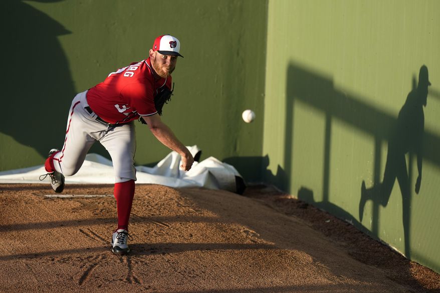 Washington Nationals pitcher Stephen Strasburg warms up in the bullpen before the team's spring training baseball game against the Houston Astros, Tuesday, March 9, 2021, in West Palm Beach, Fla. (AP Photo/Lynne Sladky) **FILE**