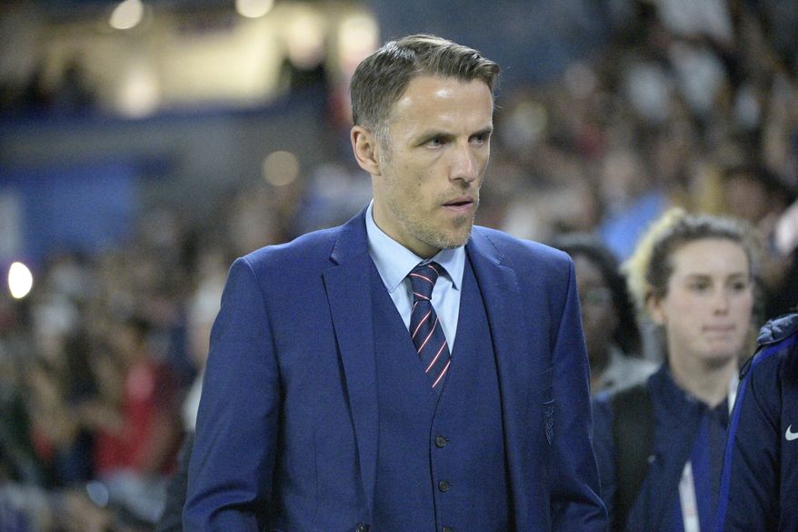England head coach Phil Neville walks onto the field before a SheBelieves Cup women&#39;s soccer match against the United States Wednesday, March 7, 2018, in Orlando, Fla. Phil Neville says the excitement for his new gig at Inter Miami still feels fresh, even though he took the job back in January. Neville led England to the Women’s World Cup semifinals in 2019. It was expected that he&#39;d take the team to the Olympics in Tokyo this summer, but he left early coach David Beckham&#39;s Major League Soccer team. (AP Photo/Phelan M. Ebenhack)