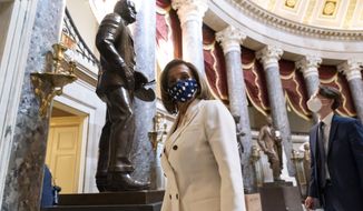 House Speaker Nancy Pelosi of Calif., walks through Statuary Hall, during the vote on the Democrat&#39;s $1.9 trillion COVID-19 relief bill, on Capitol Hill, Wednesday, March 10, 2021, in Washington. (AP Photo/Alex Brandon)