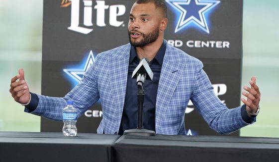 Dallas Cowboys quarterback Dak Prescott speaks during a news conference at the team&#39;s NFL football practice facility in Frisco, Texas, Wednesday, March 10, 2021. The Cowboys and Prescott have finally agreed on the richest contract in club history, two years after negotiations began with the star quarterback. (AP Photo/LM Otero)