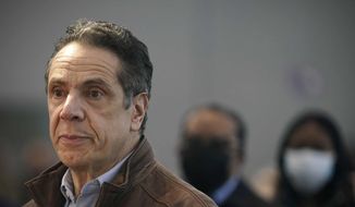 FILE - This Monday, March 8, 2021, file photo shows New York Gov. Andrew Cuomo speaking at a vaccination site in New York. A sixth woman has come forward alleging that Cuomo inappropriately touched her late last year, during an encounter at the governor&#x27;s mansion. (AP Photo/Seth Wenig, Pool, File)