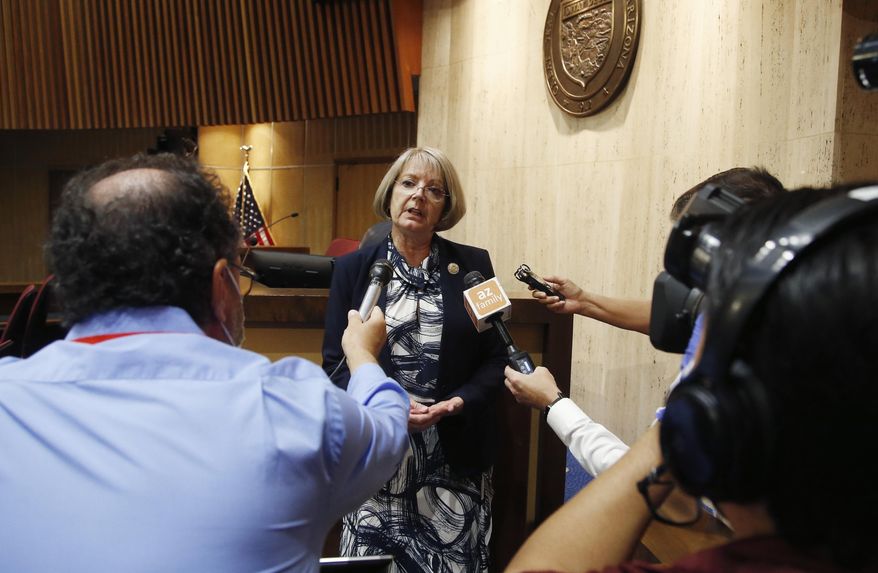 FILE - In this May 26, 2020, file photo, Arizona Senate President Karen Fann, R-Prescott, speaks to the media in Phoenix. Arizona&#39;s Republican Senate president said Wednesday, March 10, 2021, she has narrowed the search for a firm to do a full audit of the 2020 election results in the state&#39;s most populous county and plans to invite Democrats to participate in the process. Still, nearly two weeks after a judge sided with the Senate in a fight over access to ballots and elections equipment from Maricopa County&#39;s election, Senate President Fann said there are many details still to be worked out. (AP Photo/Ross D. Franklin, File)