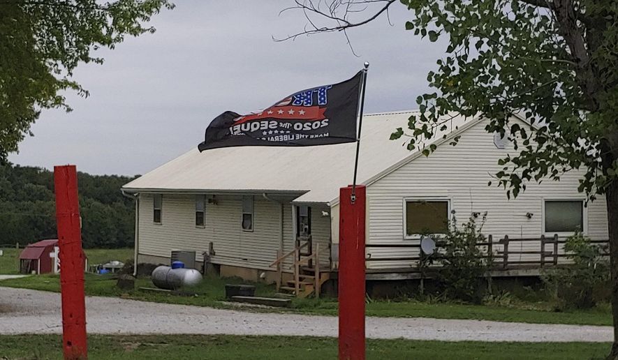 This 2020 photo shows the exterior of The Circle of Hope Girls' Ranch is in Cedar County in southwest Missouri. The owners of a boarding school in southwest Missouri are facing more than 100 charges alleging they abused girls staying at the home. Boyd and Stephanie Householder, who operated the Circle of Hope Girls Ranch in Cedar County, were charged Tuesday, March 9, 2021, and are in custody. (The Kansas City Star via AP)