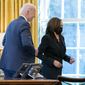 President Joe Biden and Vice President Kamala Harris, smile after Biden signed the American Rescue Plan, a coronavirus relief package, in the Oval Office of the White House, Thursday, March 11, 2021, in Washington. (AP Photo/Andrew Harnik)