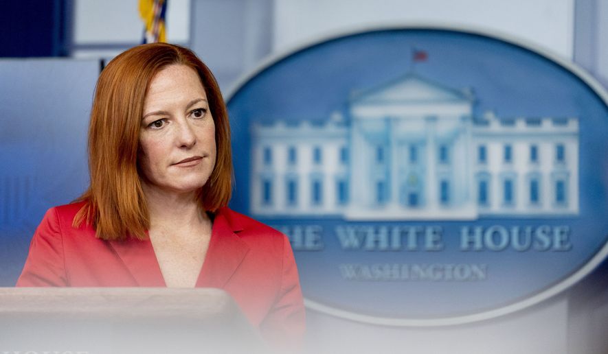 White House press secretary Jen Psaki takes a question from a reporter during a press briefing at the White House, Thursday, March 11, 2021, in Washington. (AP Photo/Andrew Harnik)