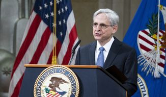 President Joe Biden&#39;s pick for attorney general Merrick Garland, addresses staff on his first day at the Department of Justice, Thursday, March 11, 2021,  in Washington. (Kevin Dietsch/Pool via AP)  **FILE**