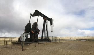 An oil well is seen east of Casper, Wyo., on Feb. 26, 2021. President Joe Biden&#39;s administration is at odds with the petroleum industry in the Rocky Mountain region and beyond for imposing a moratorium on leasing federal lands for oil and gas production. (AP Photo/Mead Gruver)