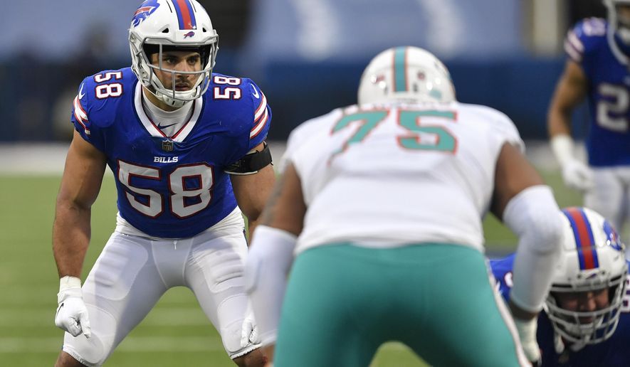 FILE - In this Sunday, Jan. 3, 2021 file photo, Buffalo Bills outside linebacker Matt Milano (58) sets up for a play in the second half of an NFL football game against the Miami Dolphins in Orchard Park, N.Y. The Buffalo Bills re-signed linebacker Matt Milano to a four-year contract on Thursday, March 11, 2021 less than a week before the three-year starter was eligible to become a free agent. The signing comes a day after the Bills freed up more than $14 million in space under the salary cap by releasing receiver John Brown and defensive lineman Quinton Jefferson.(AP Photo/Adrian Kraus, File)