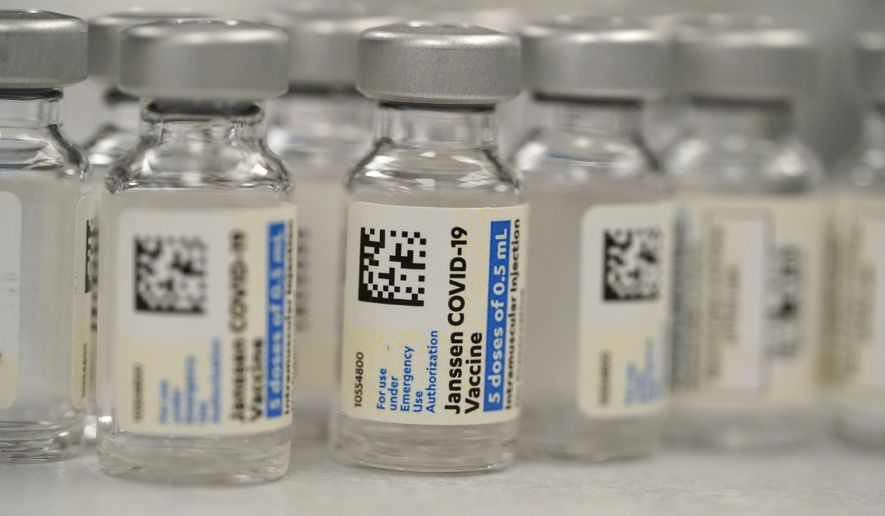 This Saturday, March 6, 2021, file photo shows vials of Johnson &amp;amp; Johnson COVID-19 vaccine in the pharmacy of National Jewish Hospital for distribution in east Denver. The European Medicines Agency is meeting Thursday, March 11, 2021, to discuss whether Johnson &amp;amp; Johnson’s one-dose coronavirus vaccine should be authorized, a move that would give the European Union a fourth licensed vaccine to try to curb the pandemic amid a stalled inoculation drive. (AP Photo/David Zalubowski, File)