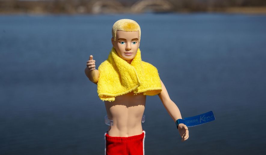 A reproduction of the original Ken doll, launched in 1961 as a companion to Barbie, appears in Bergen County, N.J., on Monday, March 8, 2021. Mattel has put the doll on sale this week to commemorate its 60th anniversary. (AP Photo/Ted Shaffrey) ** FILE **