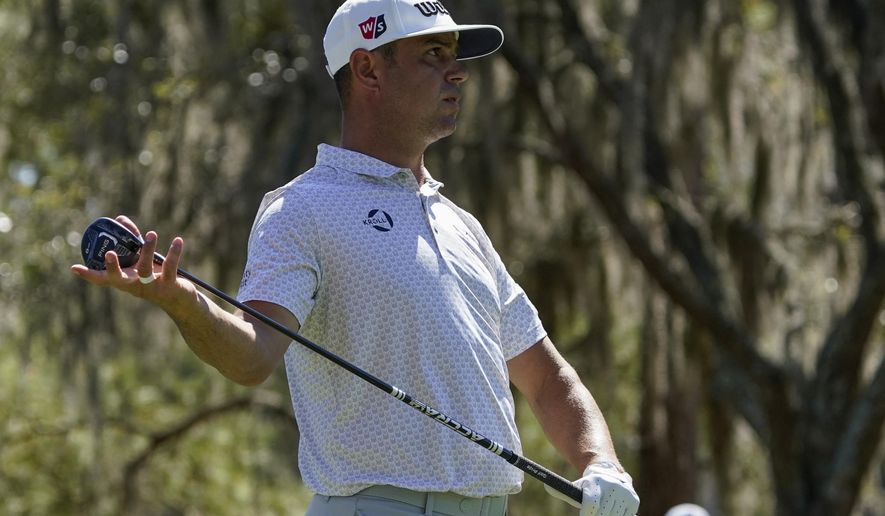 Gary Woodland watches his tee shot on the sixth hole during the first round of the The Players Championship golf tournament Thursday, March 11, 2021, in Ponte Vedra Beach, Fla. (AP Photo/John Raoux)