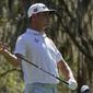 Gary Woodland watches his tee shot on the sixth hole during the first round of the The Players Championship golf tournament Thursday, March 11, 2021, in Ponte Vedra Beach, Fla. (AP Photo/John Raoux)
