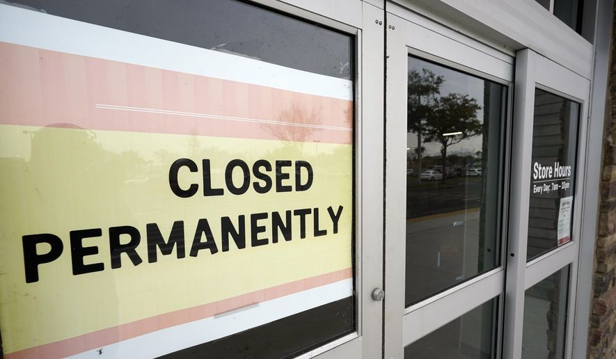 A business that has closed permanently displays a sign near the entrance, Tuesday, Jan. 12, 2021, in Orlando, Fla.   The “For Rent” signs on storefronts and offices around the world provide a stark illustration of COVID&#39;s toll on small businesses. With government restrictions and fear keeping consumers out of restaurants, stores and other establishments, businesses that operate on narrow revenue streams have struggled the past year. Or, they’ve disappeared, leaving millions of workers unemployed.   (AP Photo/John Raoux)