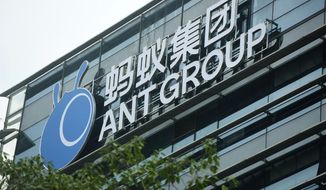FILE - In this Oct. 26, 2020, file photo, a view of the signage of Ant Group is seen at the headquarters compound of the fintech giant in Hangzhou in eastern China&#39;s Zhejiang province. The CEO of Ant Group, the world’s biggest financial technology company, has resigned from the company due to personal reasons. Ant Group thanked Simon Hu on Friday, March 12, 2021, for his contributions to the business. He had served as CEO since 2019. (Chinatopix Via AP, File)