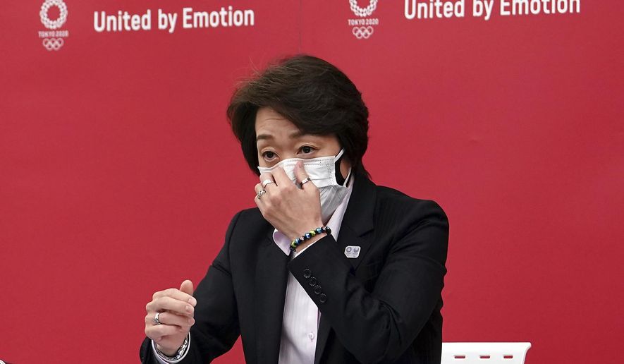 Seiko Hashimoto, president of the Tokyo 2020 Organizing Committee of the Olympic and Paralympic Games (Tokyo 2020), speaks during a news conference Thursday, March 11, 2021, after attending the International Olympic Committee (IOC) general meeting. (AP Photo/Eugene Hoshiko, Pool)
