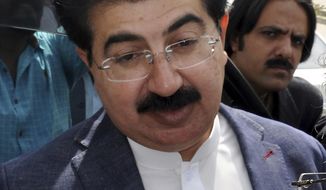 FILE - In this March 12, 2018 file photo,  chairman of the Senate Muhammad Sadiq Sanjrani speaks to reporters outside the Parliament in Islamabad, Pakistan. Sanjrani was re-elected as chairman of the Senate, Friday, March 12, 2021. (AP Photo/B.K. Bangash, File)