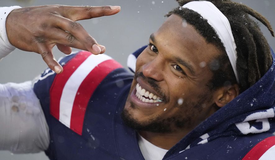 FILE - In this Jan. 3, 2021, file photo, New England Patriots quarterback Cam Newton leaves the field after an NFL football game against the New York Jets in Foxborough, Mass. The New England Patriots are completing an agreement to re-sign free-agent quarterback Cam Newton, a person with knowledge of the negotiations told The Associated Press, Friday, March 12, 2021. (AP Photo/Elise Amendola, File)