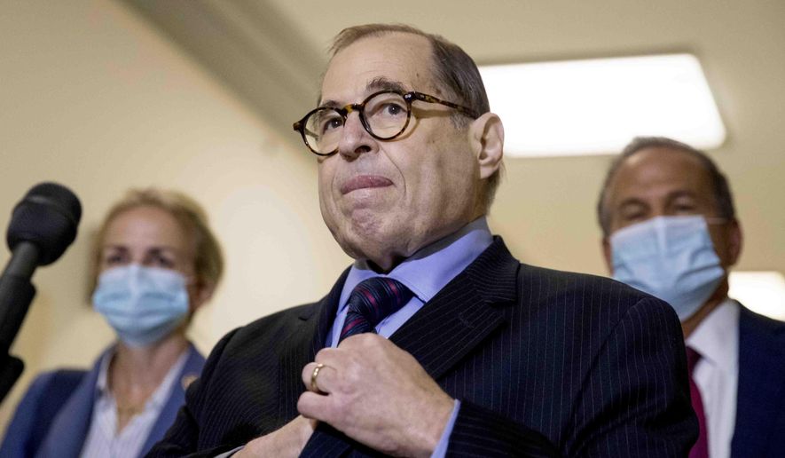 FILE - This photo from Thursday July 9, 2020, shows Chairman Rep. Jerrold Nadler, D-N.Y., center, accompanied by Rep. Madeleine Dean, D-Pa., left, and Rep. David Cicilline, D-R.I., right, during a press briefing of the House Judiciary Committee on Capitol Hill in Washington. Nadler, who chairs the U.S. House Judiciary Committee, said Gov. Andrew Cuomo has lost the confidence of New Yorkers. And accusations of sexual harrassment &amp;quot;have made it impossible for him to continue to govern at this point.&amp;quot; (AP Photo/Andrew Harnik, File)