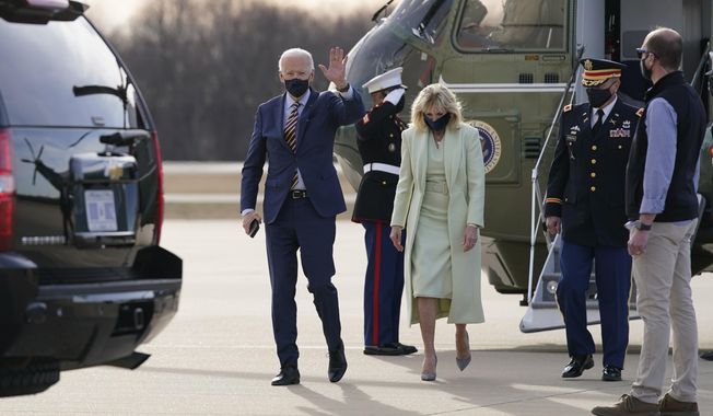 FILE - In this March 12, 2021, file photo President Joe Biden and first lady Jill Biden walk to a motorcade vehicle after stepping off Marine One at Delaware Air National Guard Base in New Castle, Del. The Bidens are spending the weekend at their home in Delaware. (AP Photo/Patrick Semansky, File)