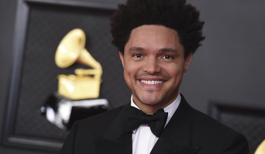 Trevor Noah arrives at the 63rd annual Grammy Awards at the Los Angeles Convention Center on Sunday, March 14, 2021. (Photo by Jordan Strauss/Invision/AP)