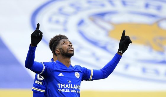 Leicester&#39;s Kelechi Iheanacho celebrates after scoring his side&#39;s third goal during the English Premier League soccer match between Leicester City and Sheffield United at the King Power Stadium in Leicester, England, Sunday, March 14, 2021. (Lindsey Parnaby/Pool via AP)
