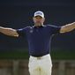 Lee Westwood, of England, celebrates after a birdie on the 18th hole during the final round of The Players Championship golf tournament Sunday, March 14, 2021, in Ponte Vedra Beach, Fla. (AP Photo/Gerald Herbert)