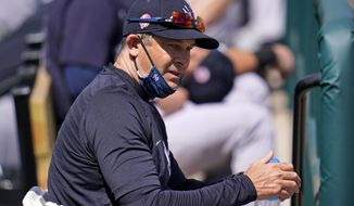 New York Yankees manager Aaron Boone takes a drink of water during a spring training exhibition baseball game against the Detroit Tigers at Joker Marchant Stadium in Lakeland, Fla., Tuesday, March 9, 2021. (AP Photo/Gene J. Puskar