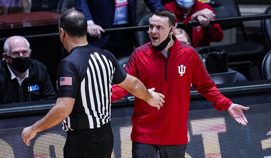 Indiana head coach Archie Miller complains to official Bo Boroski after receiving a technical foul during the second half of an NCAA college basketball game against Purdue in West Lafayette, Ind., Saturday, March 6, 2021. (AP Photo/Michael Conroy)