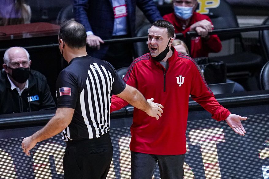 Indiana head coach Archie Miller complains to official Bo Boroski after receiving a technical foul during the second half of an NCAA college basketball game against Purdue in West Lafayette, Ind., Saturday, March 6, 2021. (AP Photo/Michael Conroy)