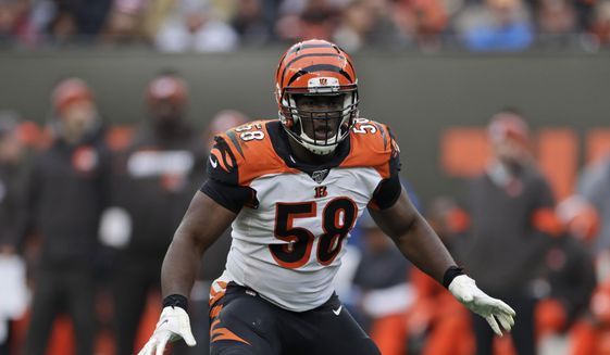 FILE - In this Sunday, Dec. 8, 2019, file photo, Cincinnati Bengals defensive end Carl Lawson (58) keeps watch during the second half of an NFL football game against the Cleveland Browns, in Cleveland. On Monday, March 15, 2021, the Jets agreed to terms on a three-year deal with former Cincinnati Bengals defensive end Carl Lawson, according to a person with direct knowledge of the move. (AP Photo/Ron Schwane, File)