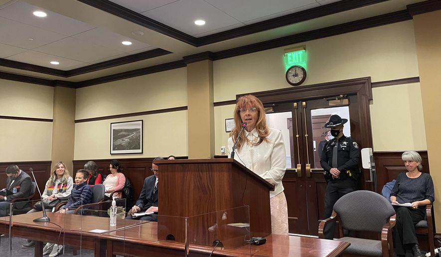 Republican state Rep. Karey Hanks addresses the House State Affairs Committee, Monday, March 15, 2021, in the Statehouse in Boise, Idaho. The committee approved legislation to prohibit mask mandates by government entities in Idaho. (AP Photo/Keith Ridler)