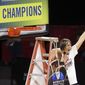 Stanford head coach Tara VanDerveer waves the net after defeating UCLA in an NCAA college basketball game in the Pac-12 women&#39;s tournament championship Sunday, March 7, 2021, in Las Vegas. (AP Photo/Isaac Brekken)