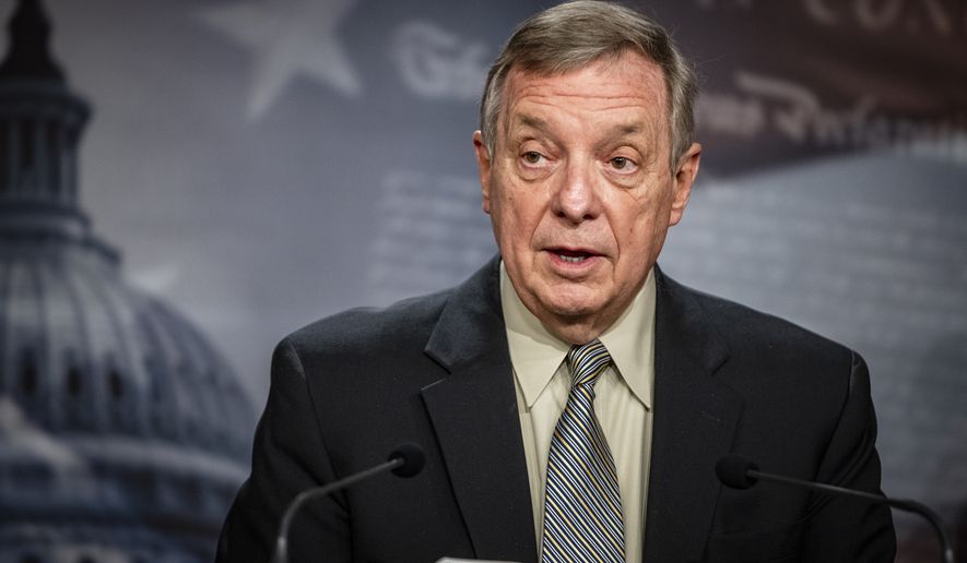 Senate Majority Whip Dick Durbin, D-Ill., speaks during a news conference at the Capitol in Washington, Tuesday, March 16, 2021. (Samuel Corum/Pool via AP)