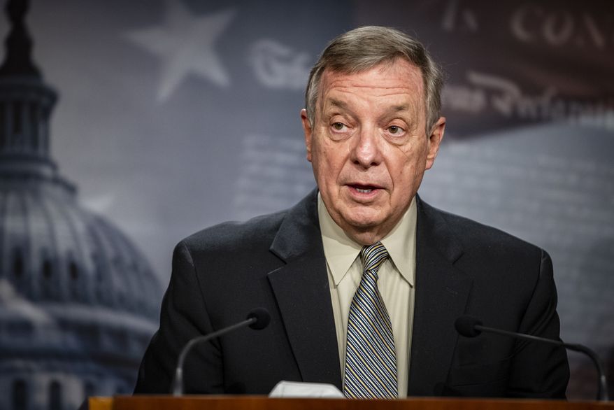 Senate Majority Whip Dick Durbin, D-Ill., speaks during a news conference at the Capitol in Washington, Tuesday, March 16, 2021. (Samuel Corum/Pool via AP)