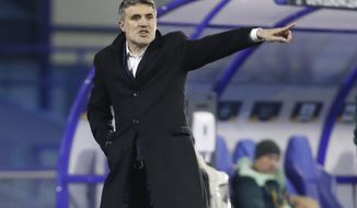 *FILE* In this Thursday, Feb. 25, 2021 file photo, Dinamo head coach Zoran Mamic gestures during the Europa League round of 32 second leg soccer match between Dinamo Zagreb and Krasnodar at the Maksimir stadium in Zagreb, Croatia.  According to a statement late Monday March 15, 2021, Mamic has resigned after the Croatian supreme court confirmed his nearly five-year prison sentence for tax evasion and fraud, just days before a Europa League match against Tottenham.(AP Photo/Darko Bandic, File)