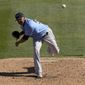 Seattle Mariners pitcher Roenis Elias throws to a Chicago White Sox batter during the fourth inning of a spring training baseball game Friday, March 5, 2021, in Phoenix. (AP Photo/Ross D. Franklin)