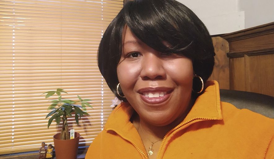 This February 2021 photo shows Stacy Hill, 48, of Philadelphia. After she lost her job and health insurance, a colonoscopy revealed two growths that were caught before they turned cancerous. “I was shocked,” Hill said. “I’m a proactive-type person so I was glad to know.” Doctors also helped her enroll in Medicaid, “so now I have medical insurance” and can continue getting cancer screenings, she said. (Stacy Hill via AP)