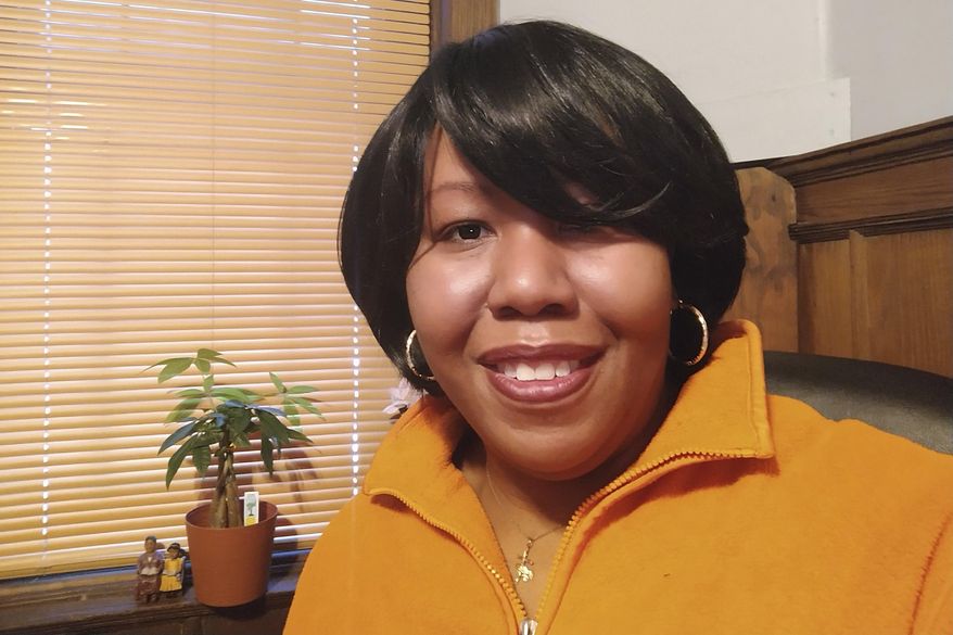 This February 2021 photo shows Stacy Hill, 48, of Philadelphia. After she lost her job and health insurance, a colonoscopy revealed two growths that were caught before they turned cancerous. “I was shocked,” Hill said. “I’m a proactive-type person so I was glad to know.” Doctors also helped her enroll in Medicaid, “so now I have medical insurance” and can continue getting cancer screenings, she said. (Stacy Hill via AP)