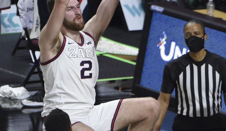 Gonzaga forward Drew Timme (2) dunks against Gonzaga during the second half in an NCAA college basketball game for the West Coast Conference men's tournament championship Tuesday, March 9, 2021, in Las Vegas. (AP Photo/David Becker)